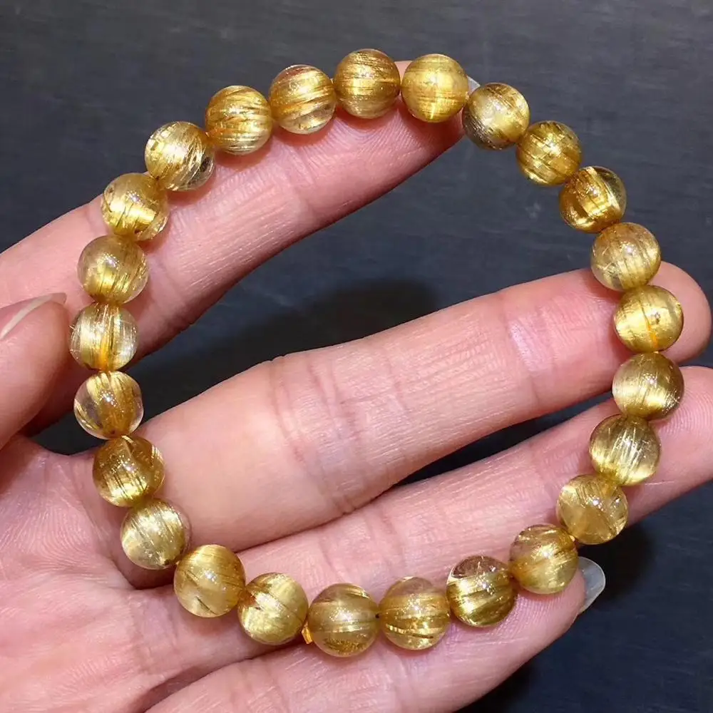 Браслет стрейчевый из натурального золота и титана с круглыми бусинами 7 2