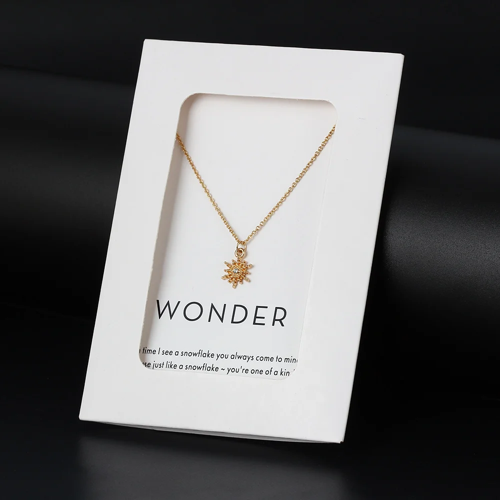 Женская цепочка с подвеской в виде снежинок золотистого и серебряного цвета