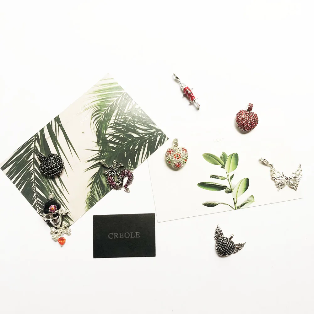 Подвеска с крылатым сердцем маской дракона пиратским черепом красной рыбой