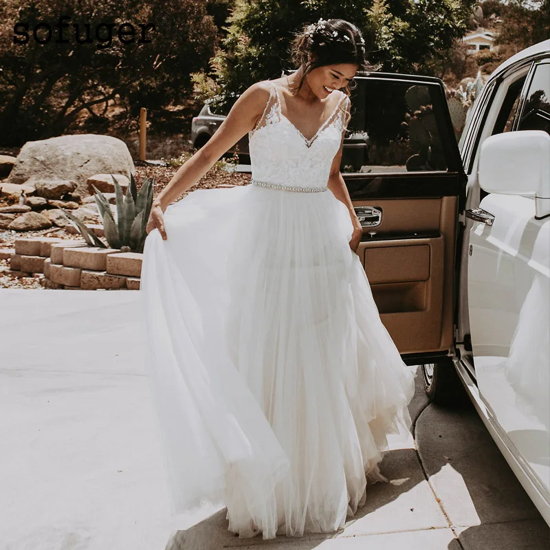 

Elegant Beach Ivory White Wedding Dress V Neck Appliques Beads Pleat Robe De Mariee Sofuge Dubai Arabic Abiti Da Sposa