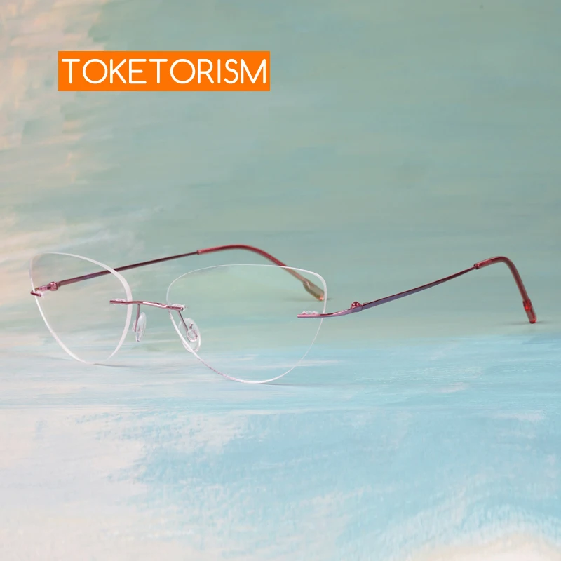 

Toketorism Ultralight Titanium Alloy Glasses Vintage Cat Eye Rimless Eyeglasses for Women Prescription Frame