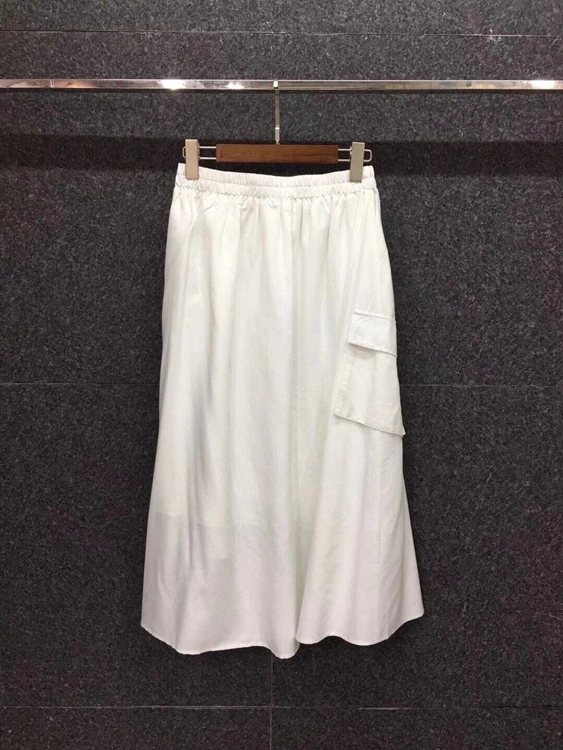 

2021 spring and summer new women's elastic waist side buckle solid color fashion versatile medium length skirt 313