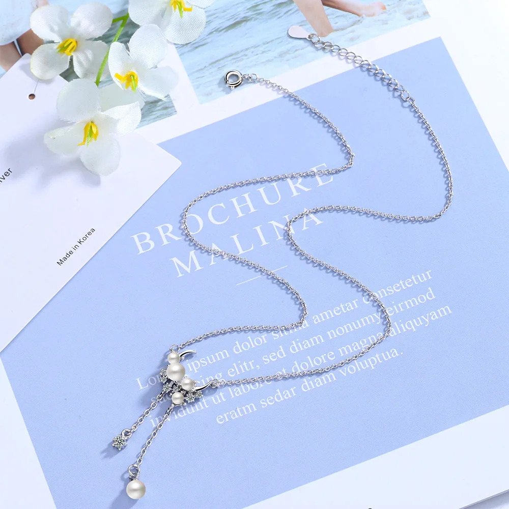 Изящное длинное ожерелье с подвеской в виде Луны и кисточки кубический цирконий