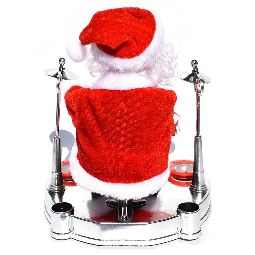 Электрический санта-клаус играет музыкальное фортепиано маленькая фигурка