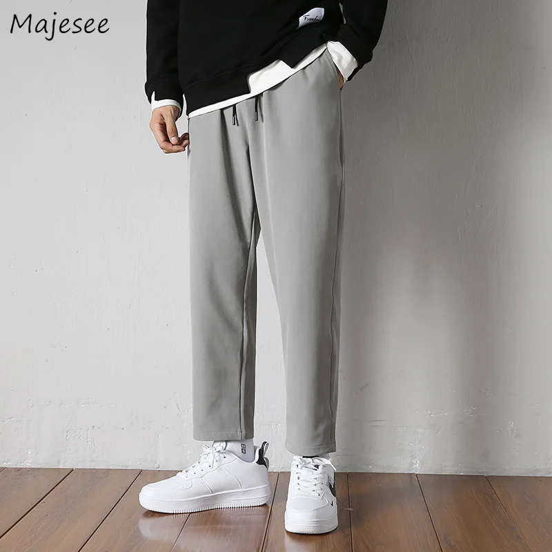 

Мужские повседневные брюки прямого свободного размера плюс 3XL в Корейском стиле; Мода для всех "Улыбка" сплошная простая студентов Молодежн...