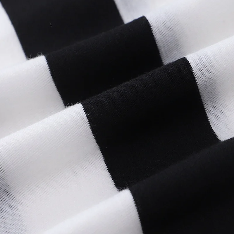 

2020 autumn black and white striped shoulder long-sleeved t-shirt female Korean style loose design niche top
