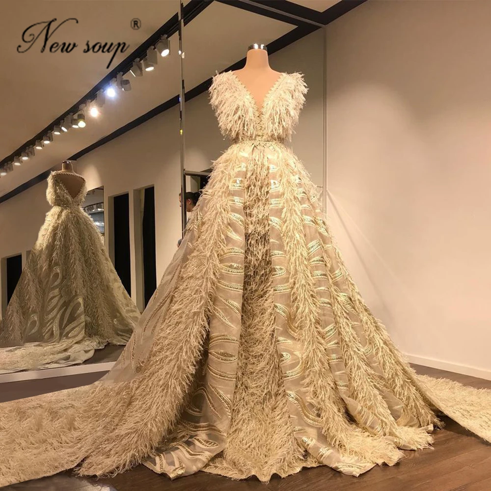 

Luxury Evening Dresses Arabic Dubai Red Carpet Gowns Prom Dresses 2021 Robe De Soiree Long Train Champagne Feathers Party Gowns