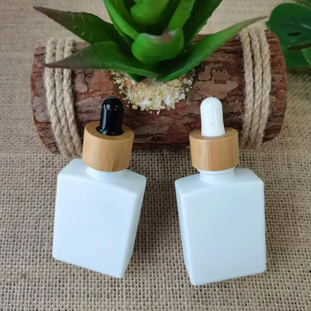 dropper bottle wholesale 30ml matte frosted white dropper bottles with bamboo white/black rubber lid