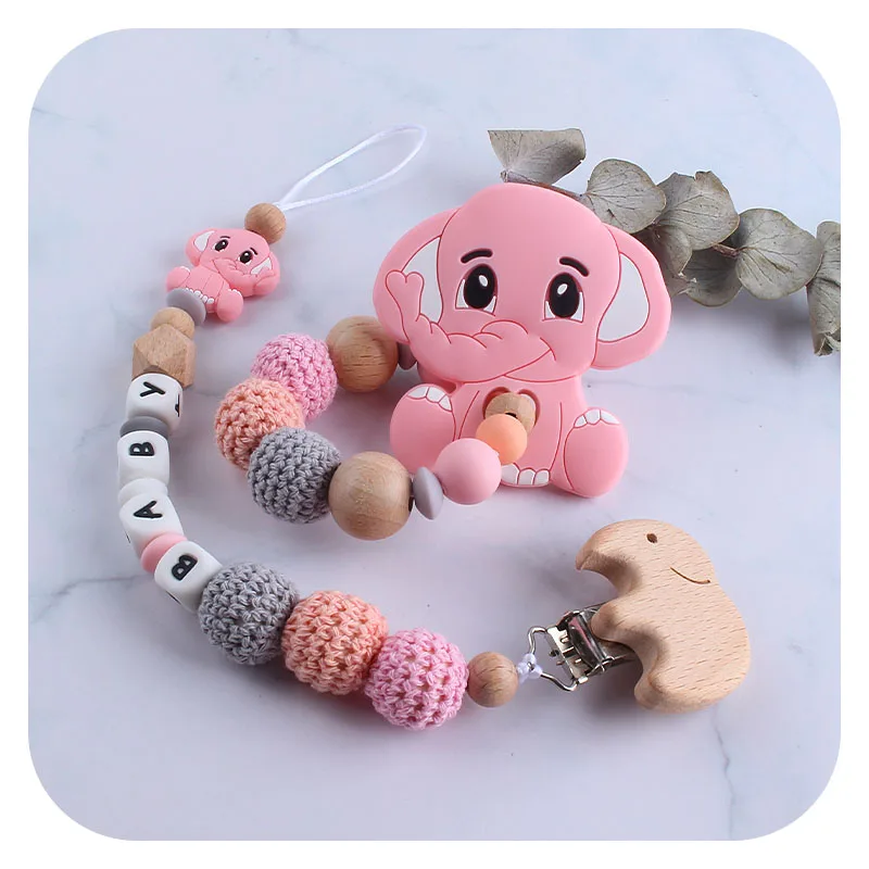 

2Pcs/set Elephant Baby Shower Gift Newborn Nursing Toy and Beech Wooden Pacifier Teether Pacifiers Holder