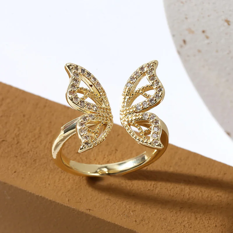 

Korean style simple and exquisite butterfly copper inlaid zirconium ring female creative high quality real gold plating rings