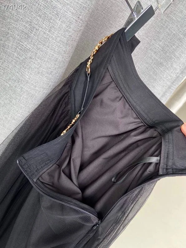 

2021 Spring and autumn lady style high-waisted slim metal chain decorative mesh fluffy pleated skirt
