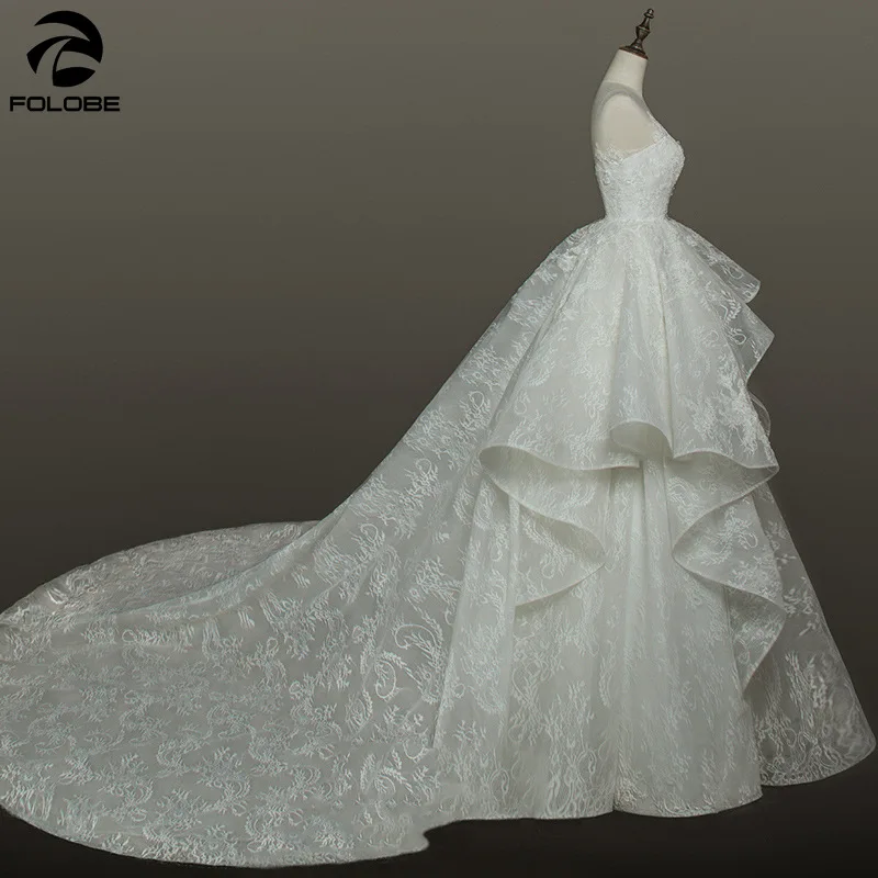 Бальное платье с оборками кружевное свадебное принцессы глубоким вырезом