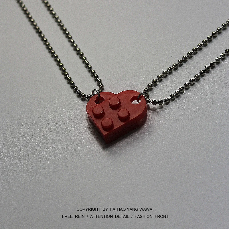 

Boring to like a person! 2 times! Building block heart necklace