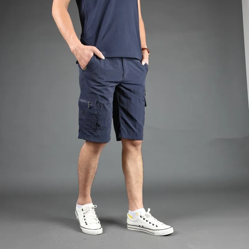 Летние тонкие быстросохнущие мужские шорты до колена с множеством карманов