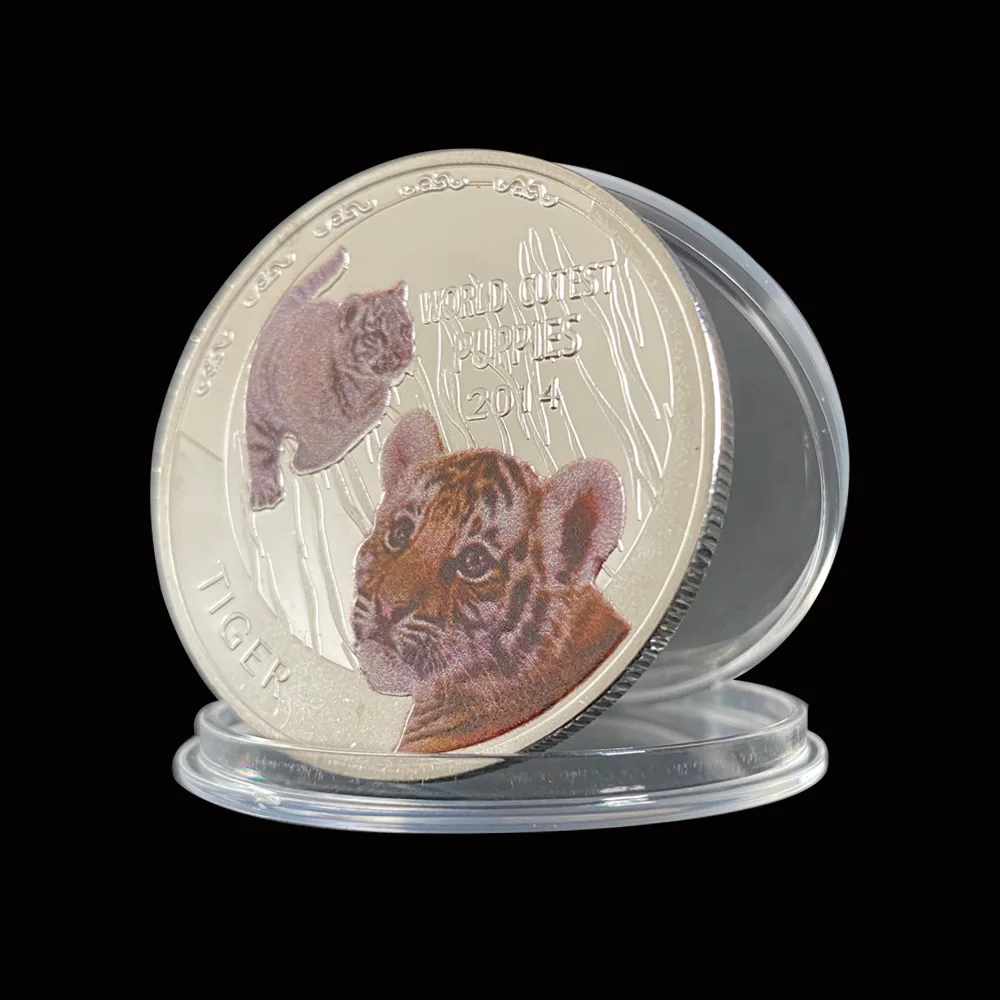 Коллекционные серебряные памятные монеты с изображением милого в мире щенка