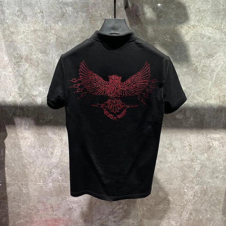 

Мужская рубашка-поло с бриллиантами и камнями