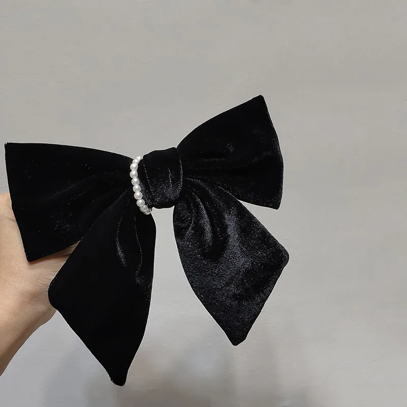

Французский черный бархатный бант, Ретро зажим сверху, элегантный темперамент, жемчужная задняя головка, зажим для слова, корейский головно...