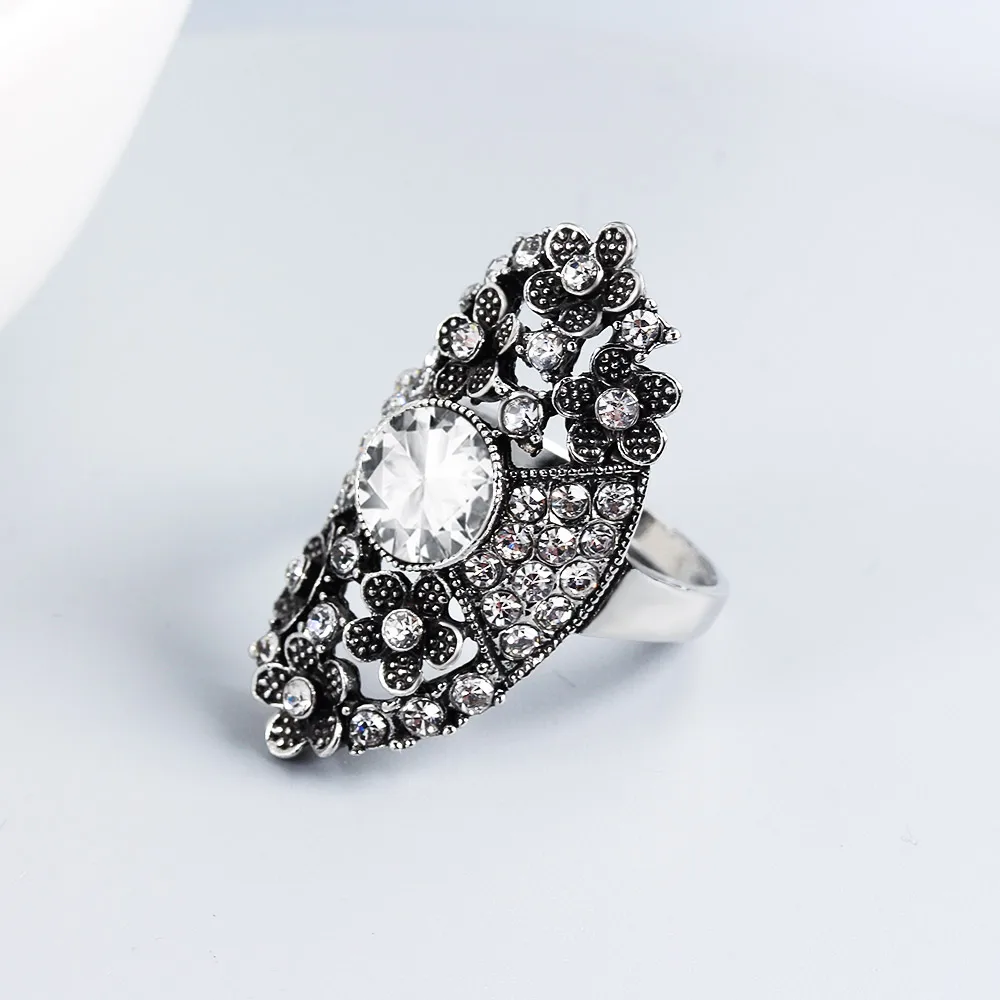 Кольцо женское с цветущим цветком прозрачное овальное большое циркониевое