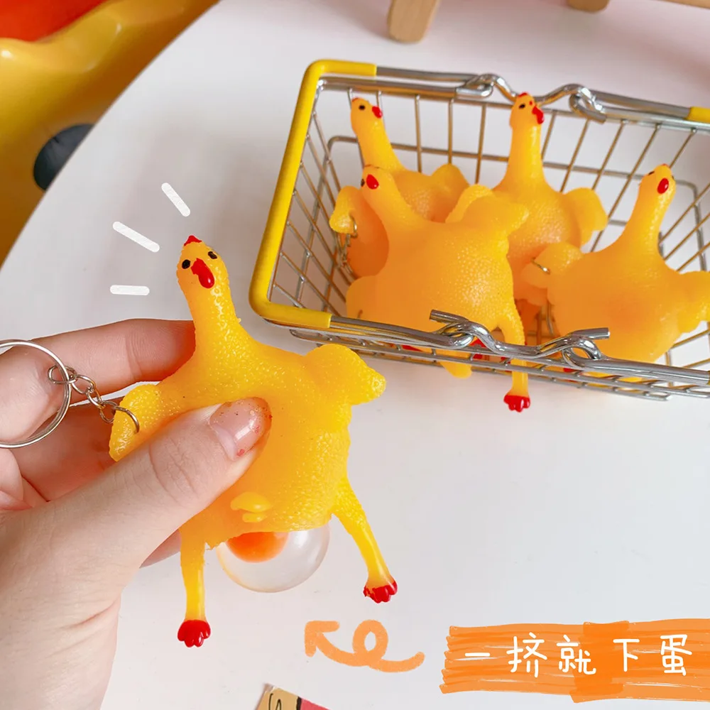 

New Funny Spoof Tricky Gadgets Green Dinosaur Beans Toy Chicken Egg Laying Hens Crowded Stress Ball Keychain Keyring Relief Gift