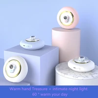 winter cold proof ufo warm baby warm rechargeable illuminated can be used as a power bank portable and durable
