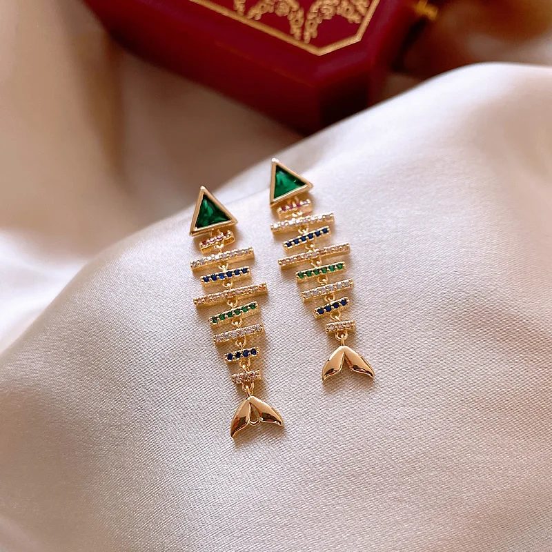 

Женские длинные серьги-подвески в виде рыбьей кости, разноцветные золотистые серьги с кристаллами, эффектные украшения для рождественской ...