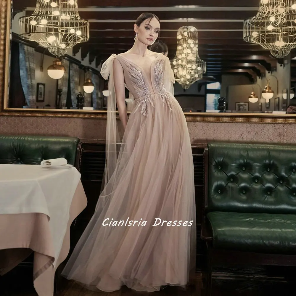 

Champagne Deep V-Neck Sleeveless Illusion A-Line Evening Dress With Ribbons Appliques Lace Beading Formal Party Prom Gown