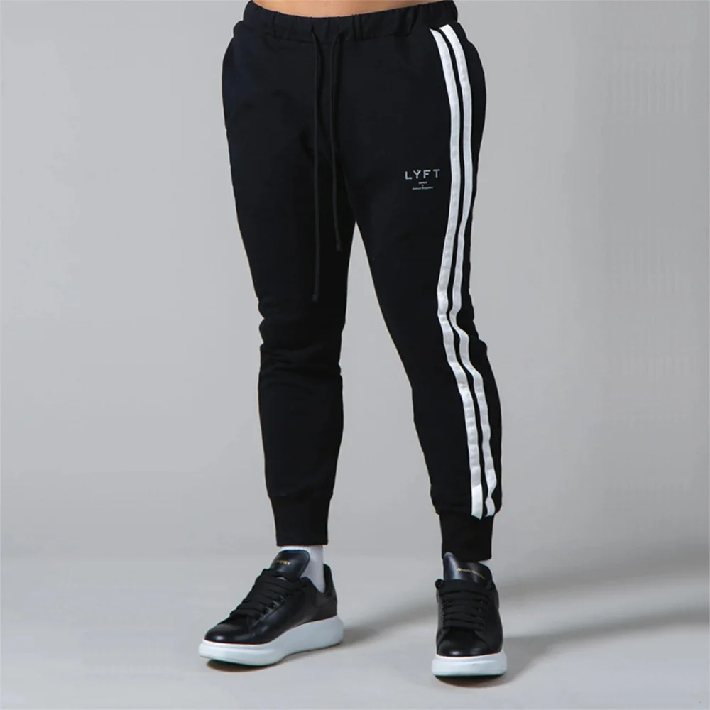 

2021 Men's White Fitness Fashion Sports Pants Workout Running Walking Bodybuilding Training Small Foot Sweatpants Trousers