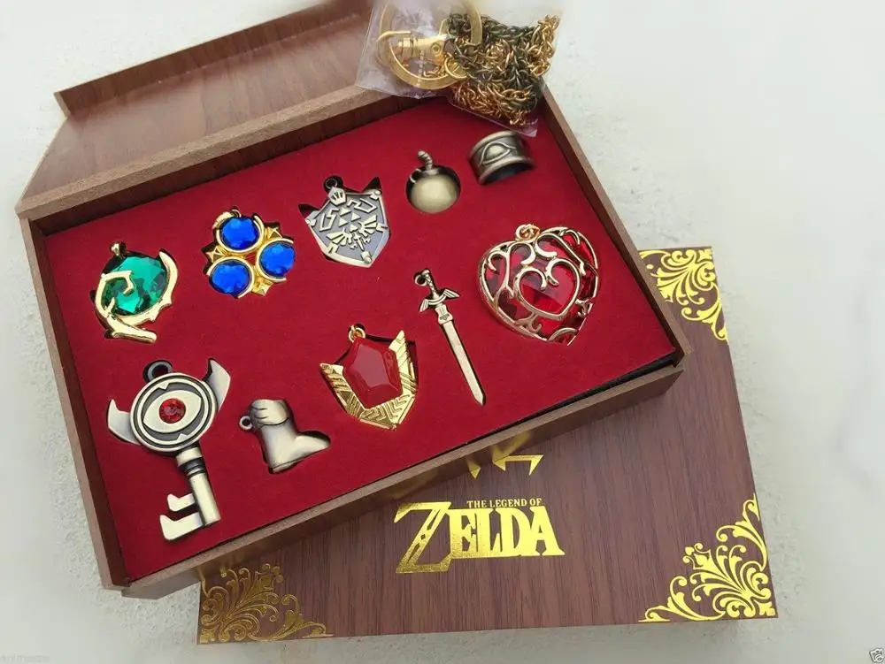 Трифорс из Hylian щит и брелок в виде меча Цепочки ожерелья Подвески Брелок Книги об