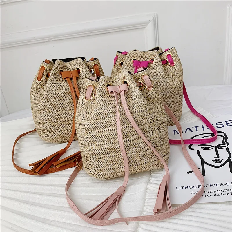 

Drawstring Women Beach Straw Bucket Bags Ins Popular Lady Shopping Mini Tassel Handbag Travel Woven New Messenger Bolsa SS3592
