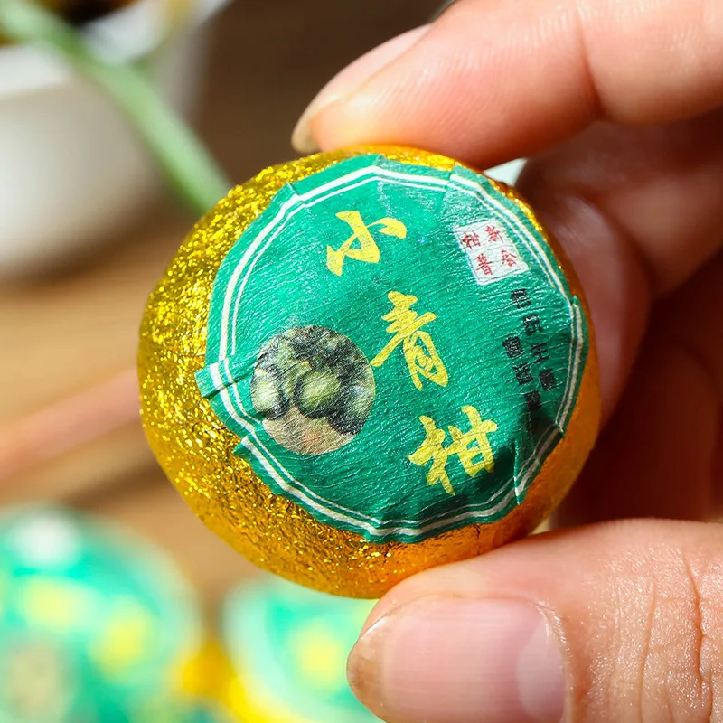 

Маленький зеленый оранжевый чай Китайский зеленый чай пластиковые банки Xinhui специальная упаковка маленькие свежие три-две пустые банки оп...