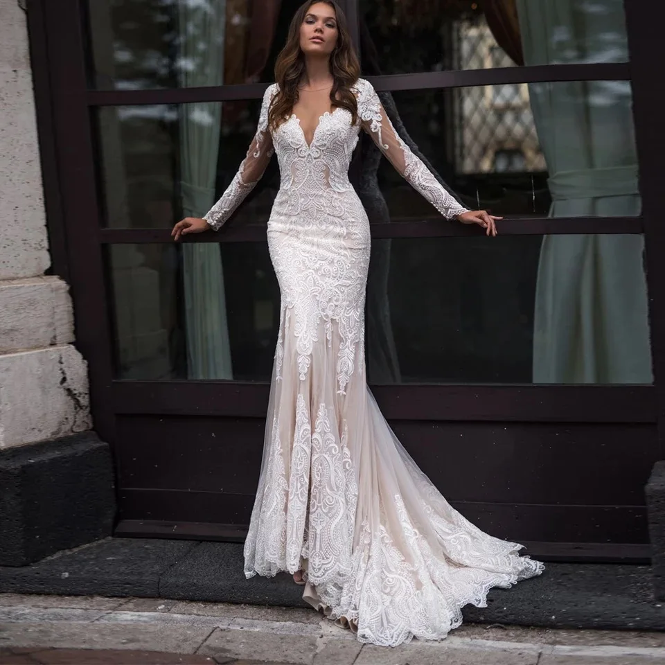 

Gorgeous Long Sleeve Lace Mermaid Wedding Dresses 2021 Illusion Tulle Bridal Gown With Button Back Sheer O-Neck Sweep Train
