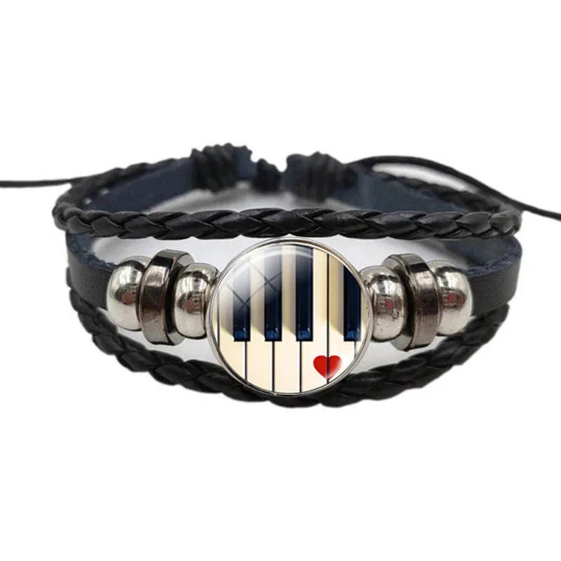 Черный классический музыкальный инструмент пианино гитара кларнет флейта