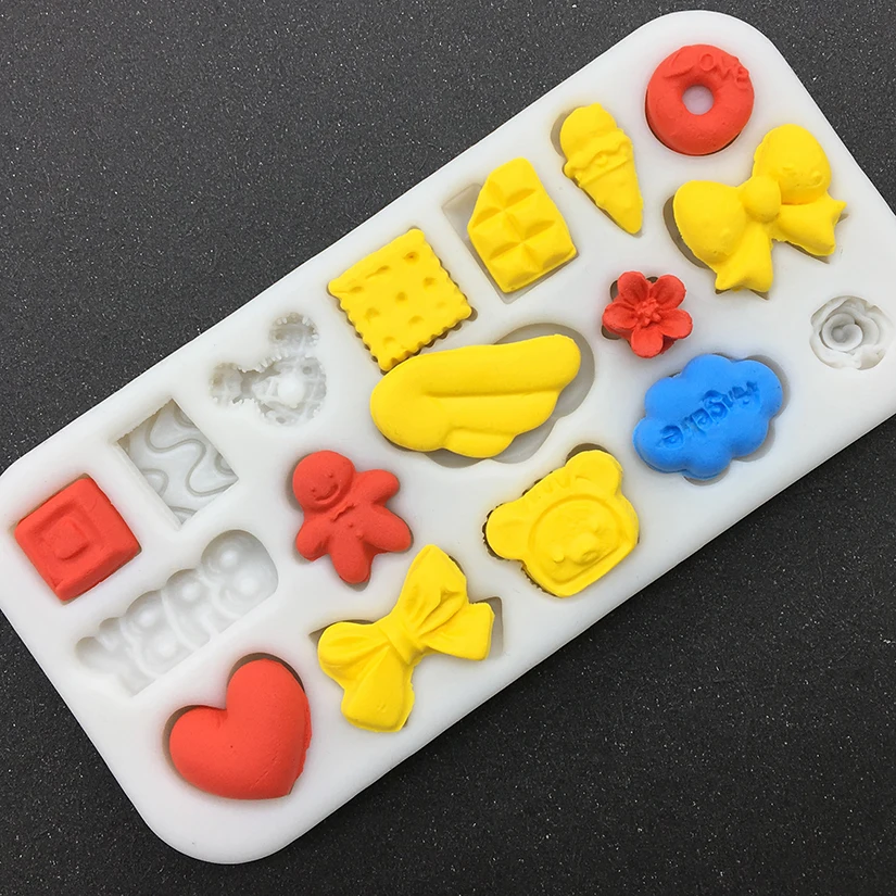 

Wholesale 10 pcs/lot Baby Bowknot Snowman Angel Silicone Sugarcraft Mold Chocolate Cupcake Baking Fondant Cake Decorating Tools