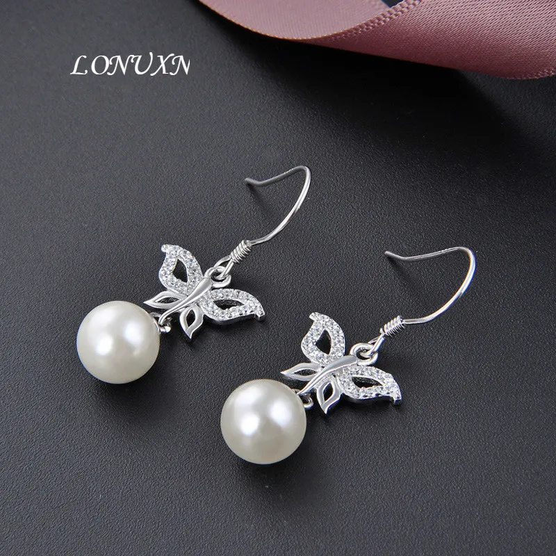Высокое качество корейская мода дикая бабочка жемчуг 925 серебряные серьги для