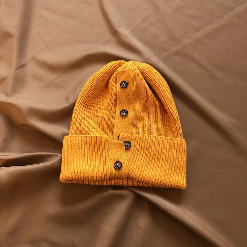 

2021 Spring Summer Woman Stylish Hot Sell Solid Color Six Colors Knitting Button Decoration Keep Warm Hat All Match