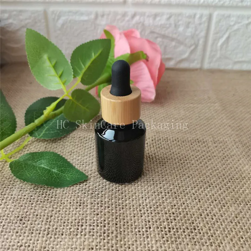 

Hot Sale 15ml/30ml cosmetic packaging custom essential oil bottle matte /clear black slant shoulder glass dropper bottle