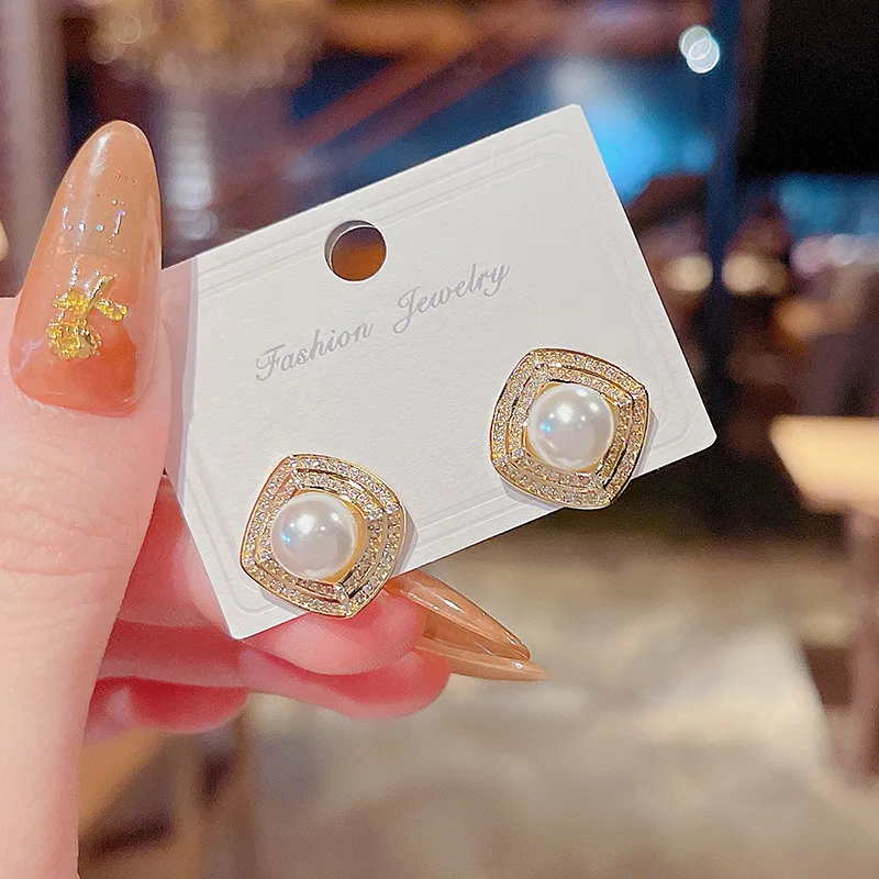 

Набор женских серег из серебра 2021 пробы с микро-инкрустацией из меди