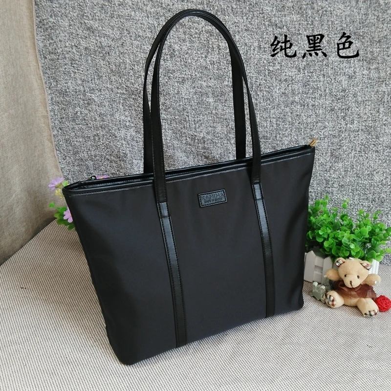

Waterproof Oxford cloth bag canvas bag travel bag female mobile handbag nylon OL bag tote bag simple commuter big bag