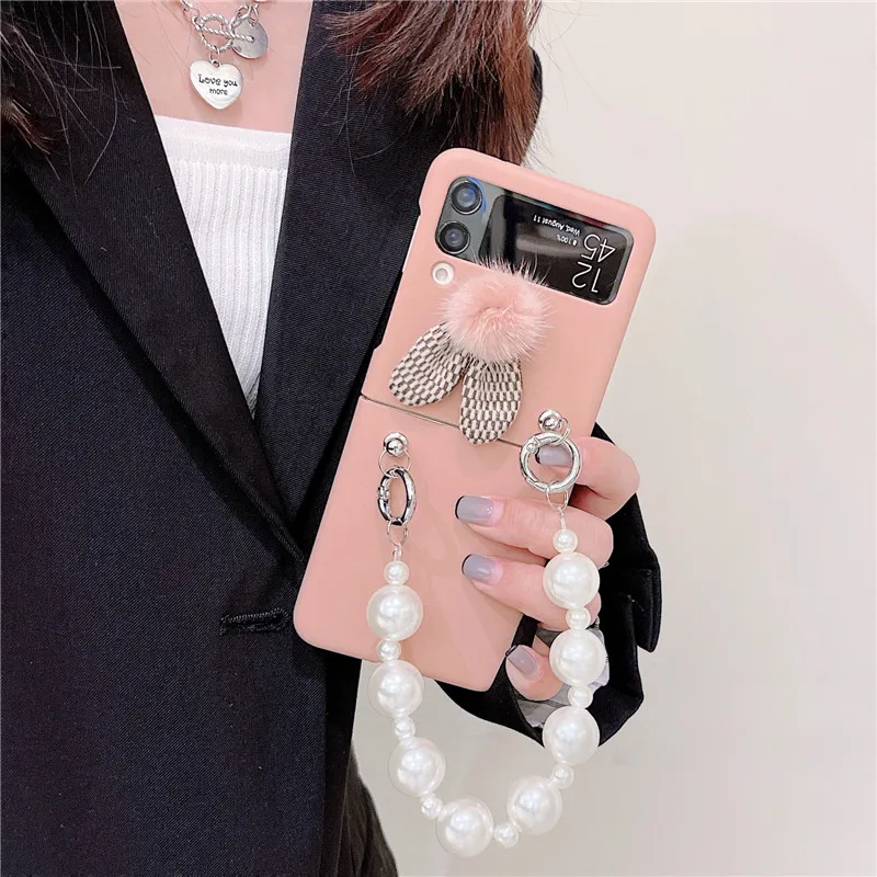 

Luxury Pearl Bracelet Phone Cases For Samsung Galaxy Z Flip 3 Fashion Plush Rabbit Ears Case For Samsung Z Flip3 ZFlip3 Zflip 3