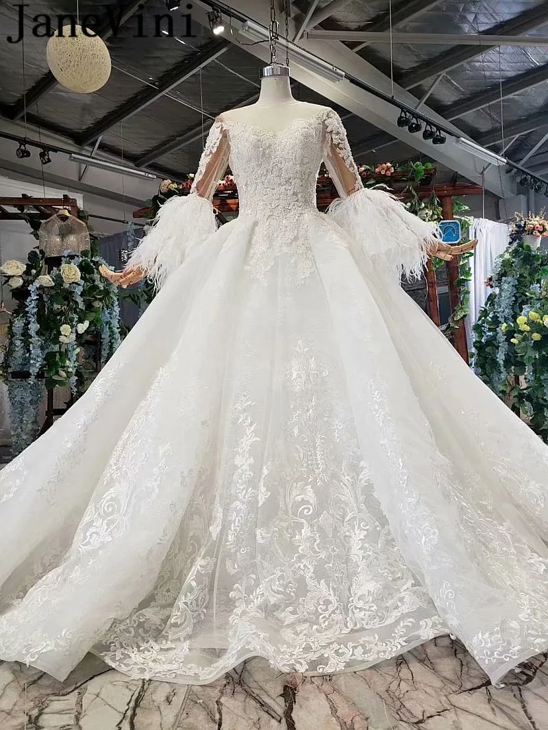 JaneVini Dubai Beaded Wedding Dress Feathers Long Sleeves Lace Pearls Ball Gown Bridal Dresses Luxury African Wedding Gowns 2020