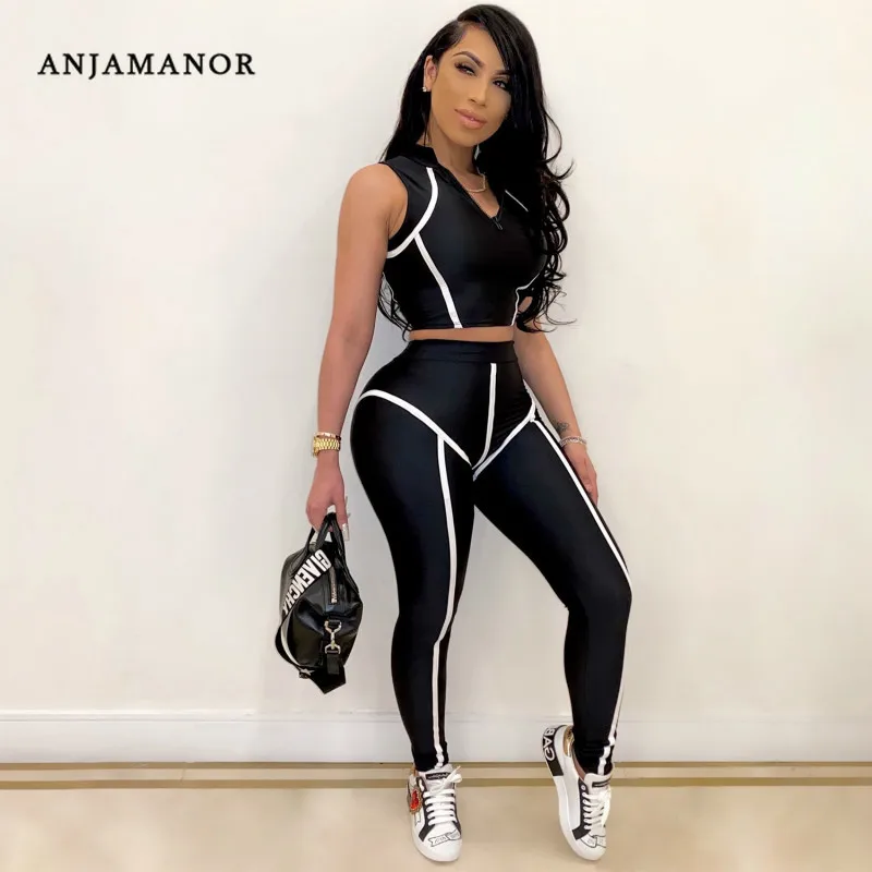 

Женский комплект из 2 предметов ANJAMANOR, летний трендовый укороченный топ и штаны-леггинсы, спортивная одежда для тренажерного зала, подходящи...