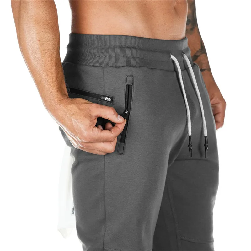 

2021 Joggers Sweatpants Mens Cotton Sports Pants Solid Slim Fit Gyms Workout Pants Casual Men Sportswear Multi-pockets Trousers