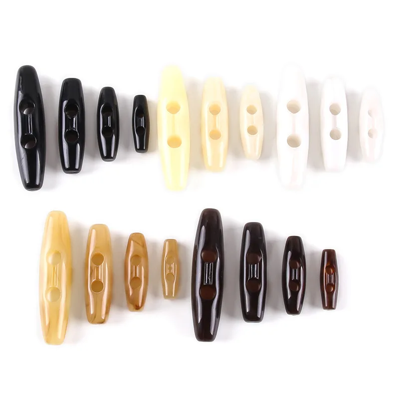 

DIY Sewing Accessories Black Acrylic Olive Horn Toggle Buttons 2 Holes Plastic Button Children Clothes Coat Overcoat 100pc/lot