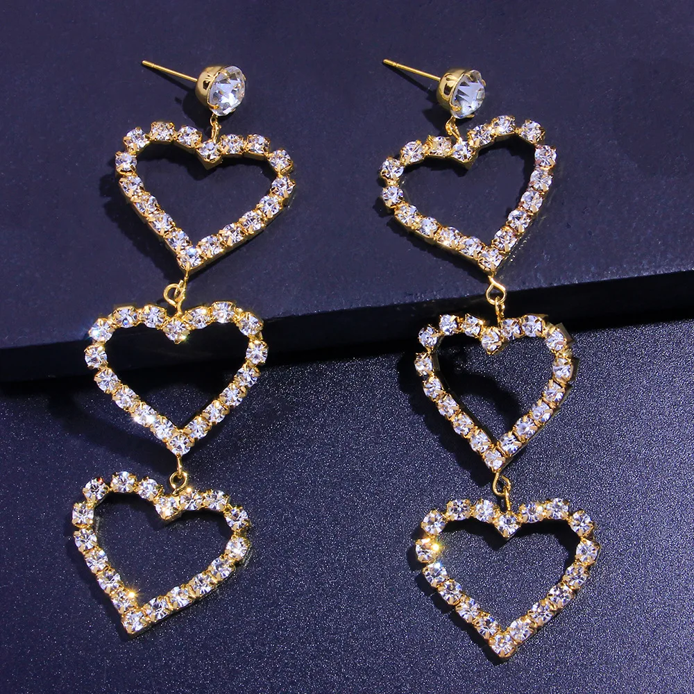 

Europe and the United States fashion earrings simple hollow Love Earrings, super shiny versatile heart-shaped full diamond earri