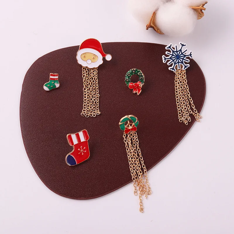 

Snowman wreath brooch Creative snowflake Santa brooch Sock deer bell tree brooch 14 Christmas brooches Christmas chain brooch