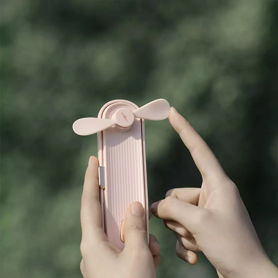 

New Xiaomi Mijia Youpin Handheld small fan 180 degree rotating hidden fan blade, can be used as a power bank low wind noise