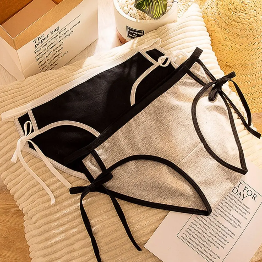 

Sexy Underwear Bow knot Bandage Cute Underpants Hollow Hot Low-Rise Panties Pure Color Thin Band Lace-up Briefs