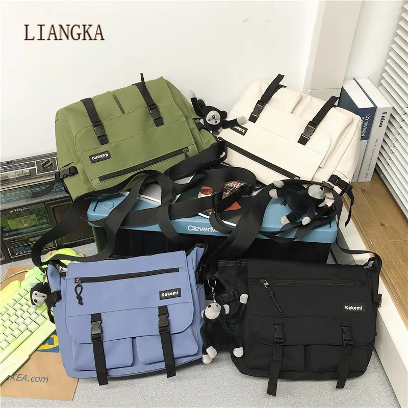

2021 New Couples Tooling Single Shoulder Bag Hip-hop Large Capacity Hong Kong Wind Hostel Slack Canvas Fashion Unisex G0619