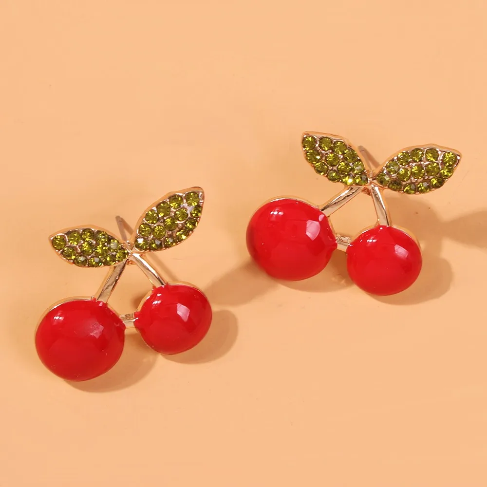 Женские серьги-вишни инкрустированные красными фруктами золотые Подвесные