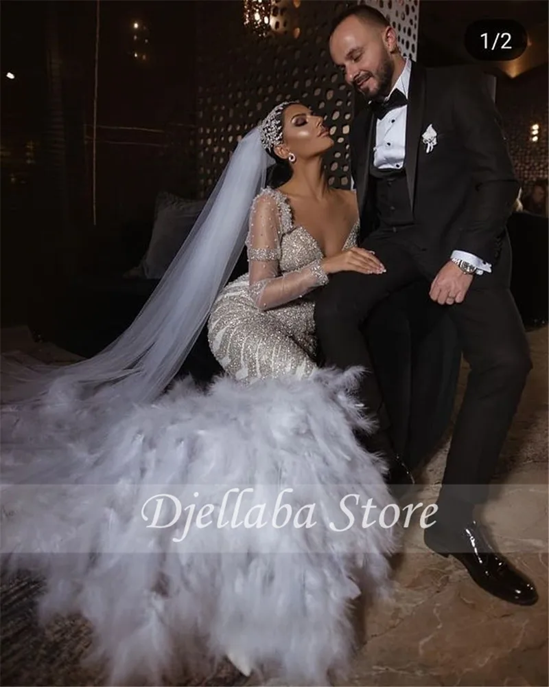 

Arabic Middle East Muslim Wedding Dresses Lace Bridal Gowns With Feathers Luxury Beading Wedding Gown Bride Dress 2021 Custom